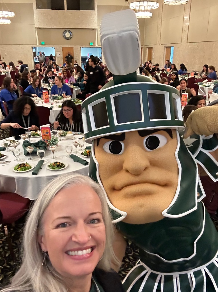 Heather with Sparty, the Mascot of Michigan State University